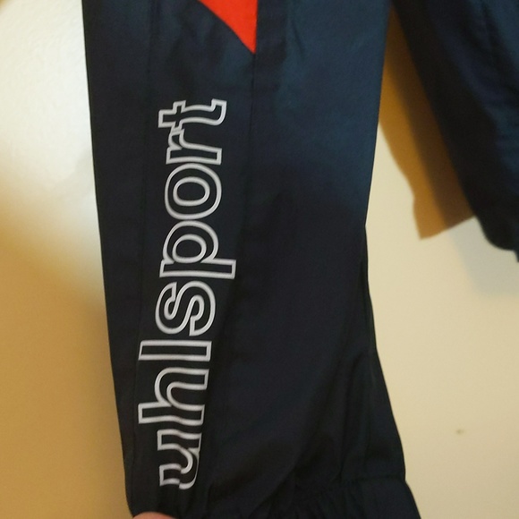 Uhlsport|Rapides Windbreaker Jacket Zippered, Zip Pockets Hidden Hood In Collar - Picture 7 of 12